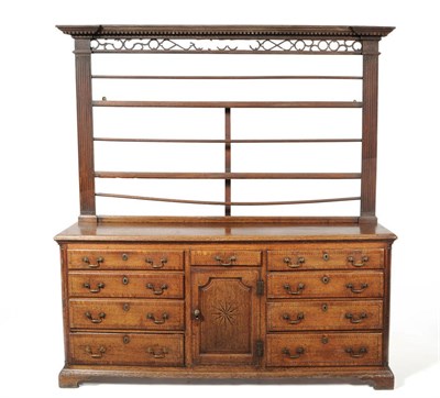 Lot 1476 - A Mid 18th Century Oak and Pine Enclosed Dresser and Rack, the rack (possibly associated) with...