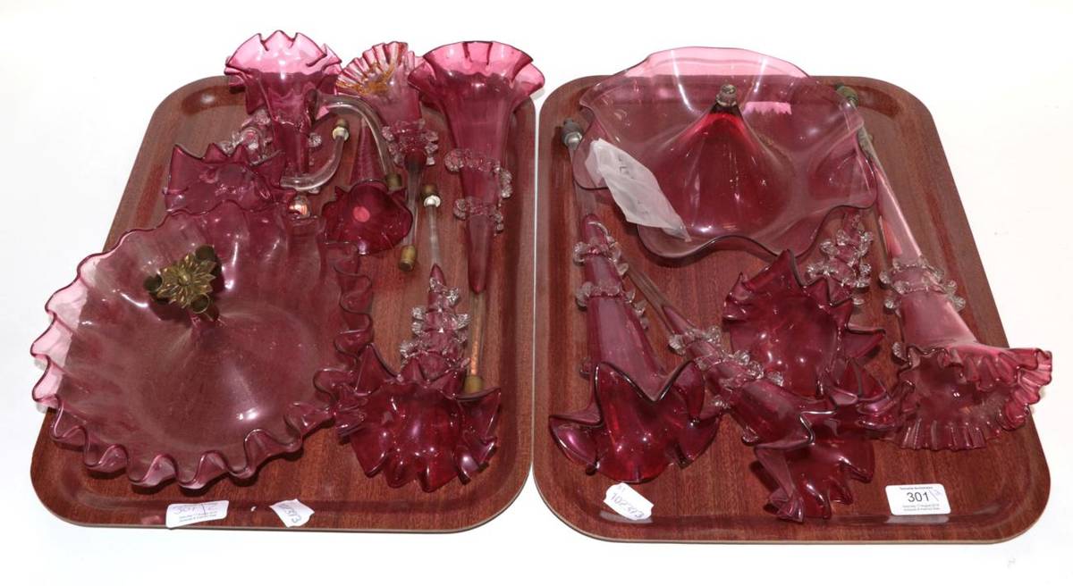 Lot 301 - Two trays of cranberry glass epergne elements