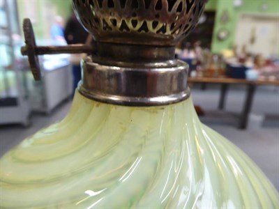 Lot 305 - A silver plated Corinthian column oil lamp with wrythen vaseline glass reservoir (a.f.)
