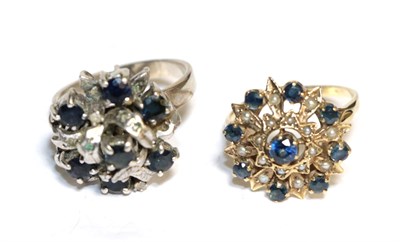 Lot 338 - A sapphire cluster ring, stamped '18K', finger size R1/2; and a sapphire and seed pearl ring,...