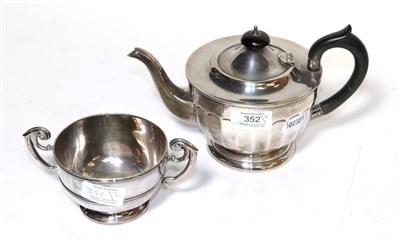 Lot 352 - A George V silver teapot, by Viners, Sheffield, 1931, the lower body faceted and on spreading foot