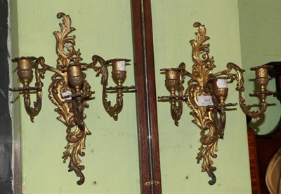 Lot 368 - A pair of French ormolu candle sconces