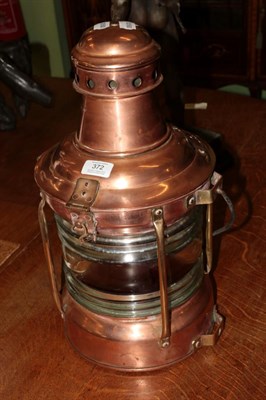 Lot 372 - A copper ships lamp