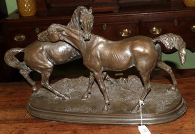 Lot 375 - After P.J. Mene, an animalier bronzed resin horse group on integral base