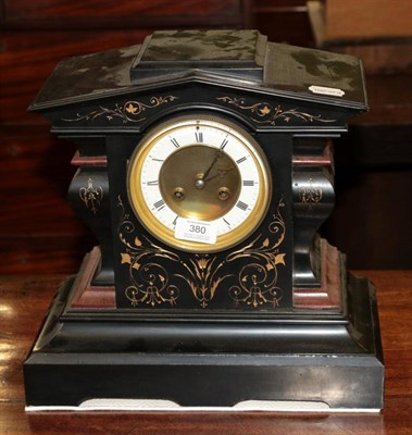 Lot 380 - A 19th century slate and rouge marble mantel clock striking on a bell