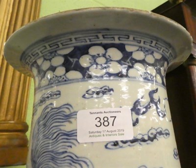 Lot 387 - An early 20th century Chinese blue and white porcelain sleeve vase of tapering cylindrical form...