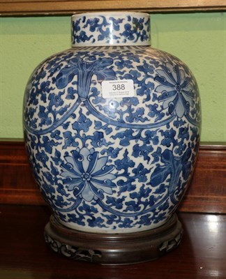 Lot 388 - An early 20th century Chinese blue and white ginger jar and cover bearing underglazed four...