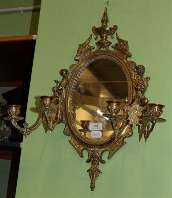 Lot 395 - A William Tonks brass mirror