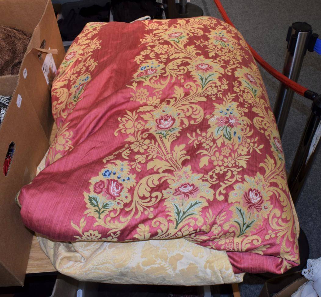 Lot 1029 - A large modern bedcover with a large central circular panel of pink woven with flowers in cream...