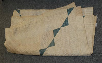 Lot 1052 - Late 19th Century Cotton Sateen Patchwork Durham Quilt, medallion style with block centre and multi