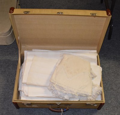 Lot 1060 - Assorted large damask table cloths, embroidered cloth, napkins, baby and toddler gowns etc (in...