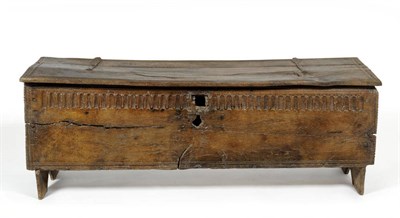 Lot 1494 - A 17th Century Oak Six Plank Large Chest, probably French, the later lid with iron hinges above...