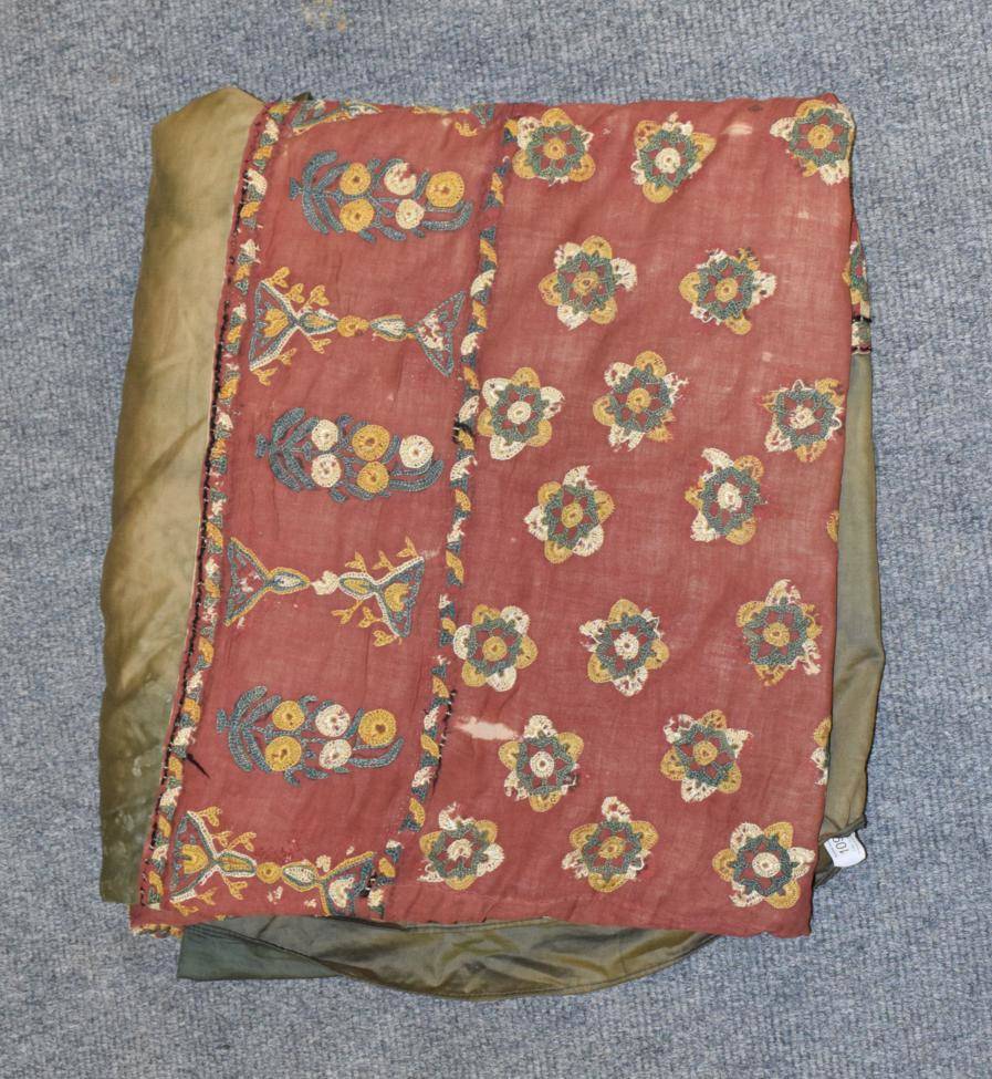 Lot 1062 - Possibly Ottoman/Eastern late 19th century bed cover, woven overall with flower heads in...