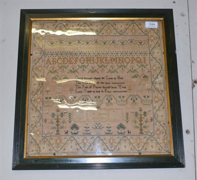 Lot 1084 - 19th century sampler worked by Ann Stariers dated 1831, with central verse in black, surrounded...