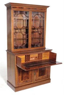 Lot 1497 - An Edwardian Mahogany and Satinwood Banded Secretaire Bookcase, circa 1900, the cavetto moulded...