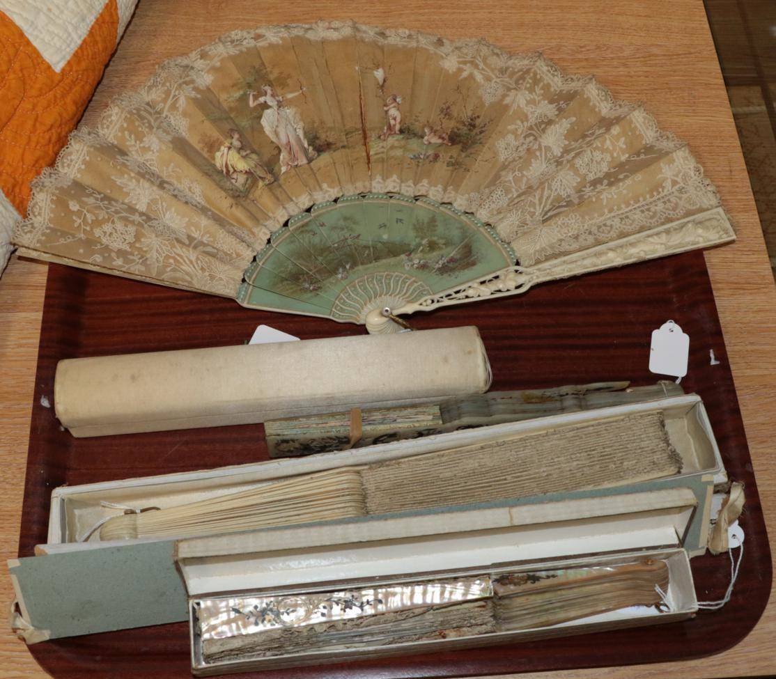 Lot 1092 - A circa 1870's to 1880's fan, with ivory monture, the guards deeply carved with scrolling...