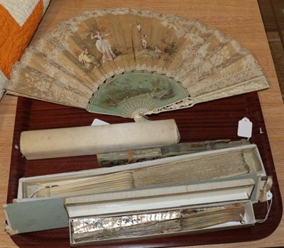 Lot 1092A - A circa 1870's to 1880's fan, with ivory monture, the guards deeply carved with scrolling...
