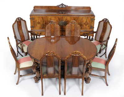 Lot 1498 - A 17th Century Style Walnut Twelve Piece Dining Room Suite, circa 1930, comprising an oval...