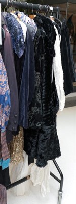 Lot 1099A - Assorted costume including a late Victorian black cape, Edwardian jacket, circa 1920s black...
