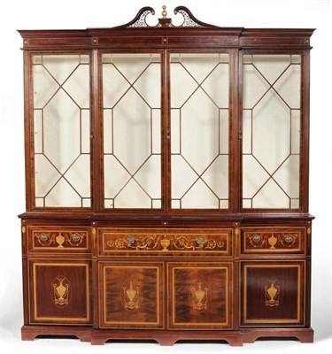 Lot 1504 - A Sheraton Revival Mahogany Satinwood Banded and Marquetry Breakfront Bookcase, the Secretaire...