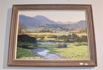 Lot 1230 - River landscape with farmhouse and hills, oil on canvas, signed Peter Symonds