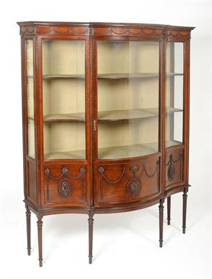 Lot 1506 - An Adams Revival Serpentine Shaped Display Cabinet, by Waring & Gillows, early 20th century,...