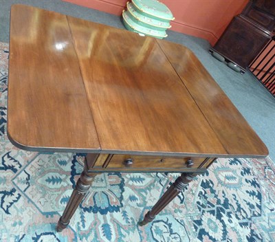 Lot 1509 - A Mahogany Pembroke Table, mid 19th century, the rectangular top with two rounded drop leaves above