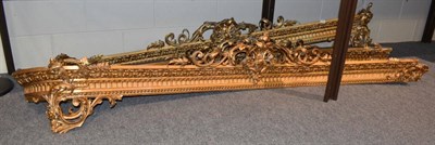 Lot 1291 - A set of three curved gilt and gesso pelmets, with acanthus scrolls and egg and dart decoration...