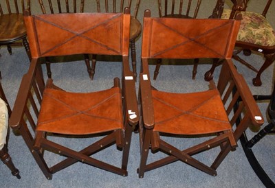 Lot 1318 - A pair of folding mahogany Director chairs with slung leather seats and backs