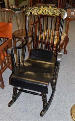 Lot 1320 - Swedish painted black spindle back rocking chair