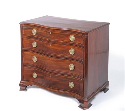 Lot 1517 - A George III Mahogany Serpentine Front Chest, early 19th century, with four long crossbanded...