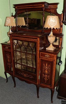 Lot 1373 - An Edwardian mahogany inlaid mirror backed display cabinet