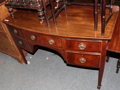 Lot 1398 - An Edwardian mahogany bow-fronted side table