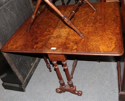 Lot 1411 - A Victorian walnut veneered Sutherland table