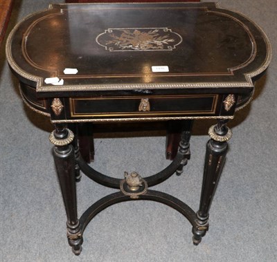 Lot 1416 - A French 19th century ebonised and brass inlaid work table