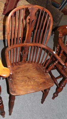 Lot 1424 - A 19th century Windsor armchair