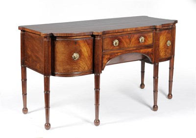 Lot 1524 - A Mahogany Sideboard, 2nd quarter 19th century, the strung top above a single frieze drawer and...