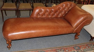 Lot 1437 - A Victorian style leather covered chaise longue