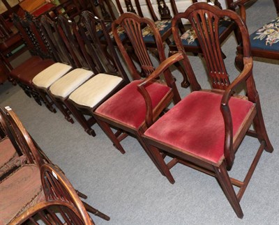 Lot 1442 - Three Hepplewhite style dining chairs; a mahogany carver chair; a matching dining chair; and...