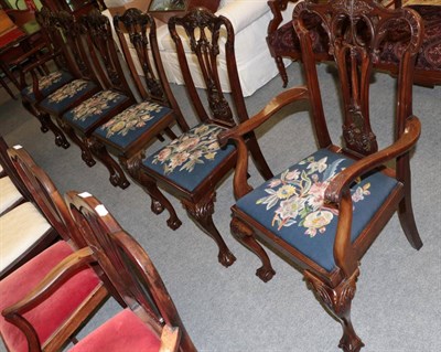 Lot 1443 - A set of six Chippendale style mahogany dining chairs, with blue floral upholstery (4+2)