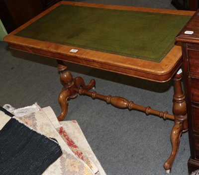 Lot 1451 - A 19th century leather inset writing table