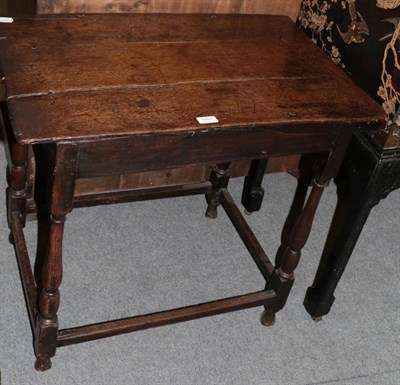 Lot 1454 - An 18th century oak side table