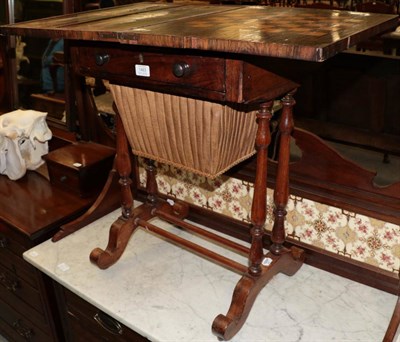 Lot 1463 - A Victorian rosewood sewing/games table