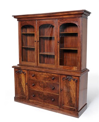 Lot 1528 - A Victorian Mahogany Bookcase, 3rd quarter 19th century, the cavetto cornice above triple-arch...