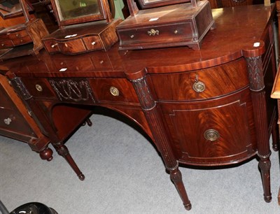 Lot 1470 - A George III style mahogany sideboard