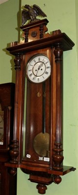 Lot 1483 - A walnut veneered double weight driven wall clock