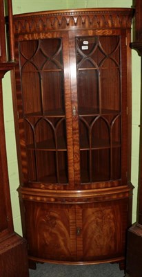 Lot 1488 - A 20th century mahogany display corner cabinet