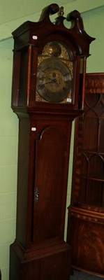 Lot 1489 - An oak eight day longcase clock, the arch brass dial with circular disc in the arch bearing a later