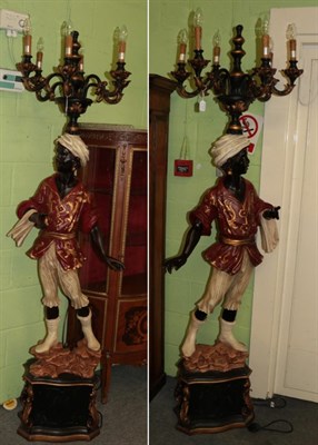 Lot 1494 - A pair of reproduction blackamoor lamps, 200cm high