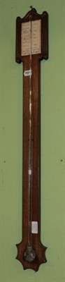 Lot 1504 - A mahogany stick barometer